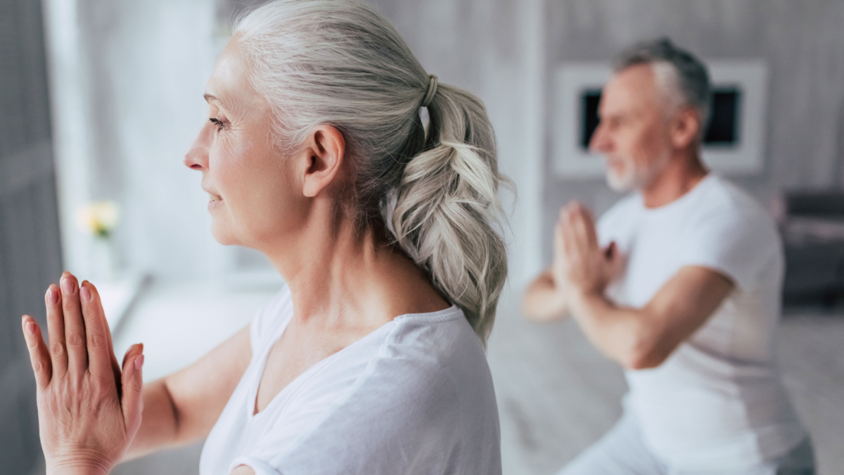 erderly couple doing yoga