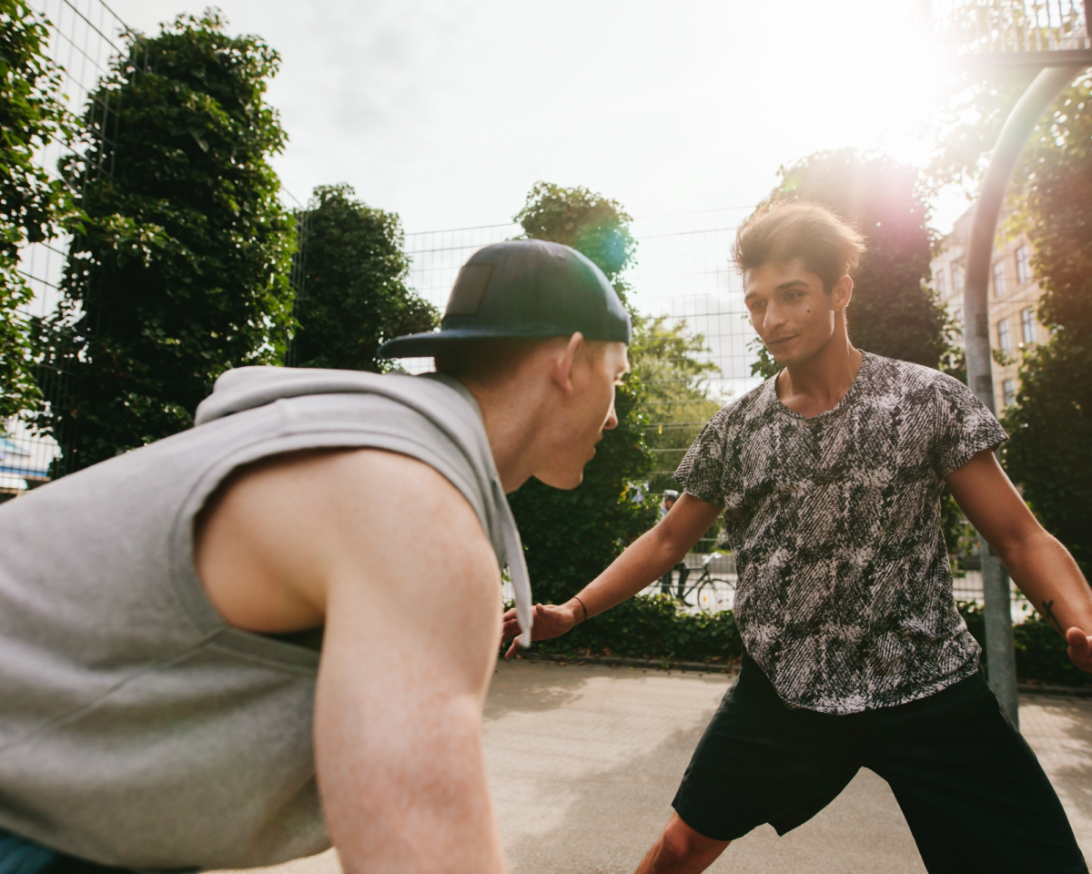 To men playing basketball for exercise