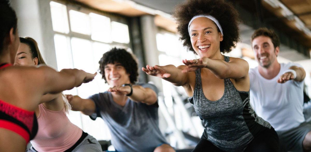 people exercising to reduce back pain